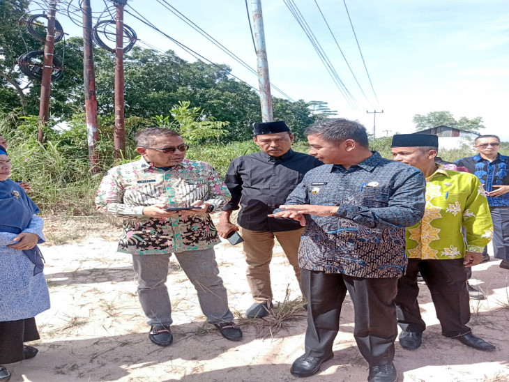 Bupati Kampar Bersama Dinas PUPR Kampar Kampar Dorong Pertumbuhan Infrastruktur di kabupaten Kampar